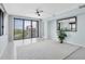 Bright living room featuring a large window overlooking the water and a neutral color palette at 6 Belleview Blvd # 706, Belleair, FL 33756