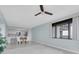 Spacious open-concept living and dining area with waterfront views and abundant natural light at 6 Belleview Blvd # 706, Belleair, FL 33756