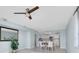 Open-concept living and dining area with views into the kitchen at 6 Belleview Blvd # 706, Belleair, FL 33756