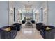 Elegant lobby with comfortable seating, sophisticated lighting, and stylish decor at 6 Belleview Blvd # 706, Belleair, FL 33756