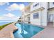 Stunning pool and patio area with water views at 900 Harbor Is, Clearwater, FL 33767