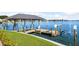 Private boat dock with covered seating area and lift at 900 Harbor Is, Clearwater, FL 33767