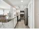 Kitchen with granite countertops and stainless steel appliances at 7518 Clanton Trl, Hudson, FL 34667