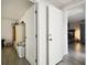 Hallway view with access to bedrooms and other rooms at 7518 Clanton Trl, Hudson, FL 34667