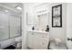 Clean bathroom featuring a white vanity, tub, and shower at 7518 Clanton Trl, Hudson, FL 34667