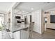 Modern kitchen with granite countertops and stainless steel appliances at 7518 Clanton Trl, Hudson, FL 34667