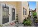 Backyard entry with lush landscaping and a charming walkway at 7518 Clanton Trl, Hudson, FL 34667