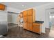 Kitchen with wood cabinets and granite countertops at 13600 Ponce De Leon Blvd, Brooksville, FL 34601