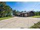 Spacious home with attached garage and large parking area at 13600 Ponce De Leon Blvd, Brooksville, FL 34601