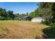 Home with expansive backyard, detached workshop, and lush landscaping at 13600 Ponce De Leon Blvd, Brooksville, FL 34601