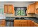 Kitchen sink and view of the backyard from the window at 13600 Ponce De Leon Blvd, Brooksville, FL 34601