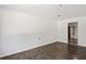Spacious spare room with dark-tiled floor at 13600 Ponce De Leon Blvd, Brooksville, FL 34601