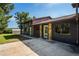 Home with stone accents and large windows at 13600 Ponce De Leon Blvd, Brooksville, FL 34601