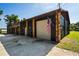 Home exterior with garage and American flag at 13600 Ponce De Leon Blvd, Brooksville, FL 34601