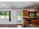 Kitchen with wood cabinets and stainless steel appliances at 13600 Ponce De Leon Blvd, Brooksville, FL 34601
