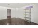 Storage room with shelving unit and exterior access at 13600 Ponce De Leon Blvd, Brooksville, FL 34601