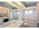 Bathroom with tub, shower, and vanity at 13600 Ponce De Leon Blvd, Brooksville, FL 34601