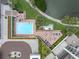 Relaxing community pool area with ample lounge chairs and patio space at 6 Belleview Blvd # 706, Belleair, FL 33756