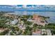 An aerial view highlights a luxury hotel with a waterfront and views of the city and a marina at 777 3Rd N Ave # 908, St Petersburg, FL 33701