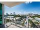 Balcony view features the stunning city skyline and nearby lake under a bright sky at 777 3Rd N Ave # 908, St Petersburg, FL 33701
