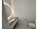 Contemporary bathroom with a sleek vanity, a modern toilet, and a wall mirror at 777 3Rd N Ave # 908, St Petersburg, FL 33701