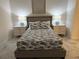 Inviting bedroom showcasing a decorative fish-themed bed, side tables with lamps, and calming decor at 777 3Rd N Ave # 908, St Petersburg, FL 33701