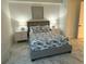 Cozy bedroom features a stylish fish-themed bed with side tables and lamps, creating a relaxing retreat at 777 3Rd N Ave # 908, St Petersburg, FL 33701