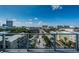 Breathtaking city views from the glass-railed balcony offer stunning cityscapes and clear blue skies at 777 3Rd N Ave # 908, St Petersburg, FL 33701