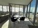 Dining area with city views through large windows at 777 3Rd N Ave # 908, St Petersburg, FL 33701