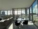 Bright dining area with floor-to-ceiling windows providing stunning city views at 777 3Rd N Ave # 908, St Petersburg, FL 33701