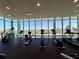 Gym with cardio machines overlooking the city skyline at 777 3Rd N Ave # 908, St Petersburg, FL 33701