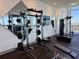 Gym featuring weightlifting racks, mirrors and city views at 777 3Rd N Ave # 908, St Petersburg, FL 33701