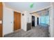Well-lit hallway leads to elevators, featuring neutral tones, and modern design at 777 3Rd N Ave # 908, St Petersburg, FL 33701