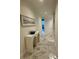 Hallway featuring modern console table with marble floors and modern artwork at 777 3Rd N Ave # 908, St Petersburg, FL 33701
