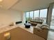 Contemporary living room with fireplace, comfortable seating, and panoramic views at 777 3Rd N Ave # 908, St Petersburg, FL 33701