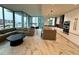 Spacious modern living room blending seamlessly with gourmet kitchen at 777 3Rd N Ave # 908, St Petersburg, FL 33701
