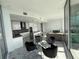 Open-concept living space with kitchen and dining area at 777 3Rd N Ave # 908, St Petersburg, FL 33701