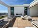 Comfortable outdoor lounge area with ample seating and a modern fireplace feature for cozy evenings at 777 3Rd N Ave # 908, St Petersburg, FL 33701
