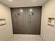 Walk-in shower featuring a double shower head, mosaic tile flooring, and a built-in niche at 777 3Rd N Ave # 908, St Petersburg, FL 33701