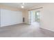 Bedroom with large closet and access to balcony at 2462 Brazilia Dr # 38, Clearwater, FL 33763