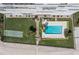 Aerial view of condo pool and shuffleboard court at 7000 Beach Plz # 505, St Pete Beach, FL 33706