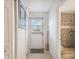 Clean entryway with access to a private patio and bathroom at 18399 Gulf Blvd # 372, Indian Shores, FL 33785
