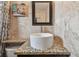Bathroom features a modern vessel sink and granite countertop at 18399 Gulf Blvd # 372, Indian Shores, FL 33785