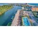Aerial view of waterfront property with pool and parking at 18399 Gulf Blvd # 372, Indian Shores, FL 33785