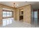 Bright dining room with view into kitchen and hallway at 6087 16Th Ne Ln, St Petersburg, FL 33703