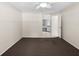 Bright bedroom with carpet flooring and a view of the en-suite bathroom at 3856 Goldfinch Ct, Palm Harbor, FL 34685