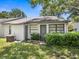 Rear view of the home with private backyard at 3856 Goldfinch Ct, Palm Harbor, FL 34685