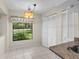 Cozy breakfast nook with window seat and built-in shelving at 3856 Goldfinch Ct, Palm Harbor, FL 34685