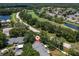 Aerial view highlighting home's location and landscaping at 3856 Goldfinch Ct, Palm Harbor, FL 34685