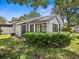Side view of the home with private backyard at 3856 Goldfinch Ct, Palm Harbor, FL 34685